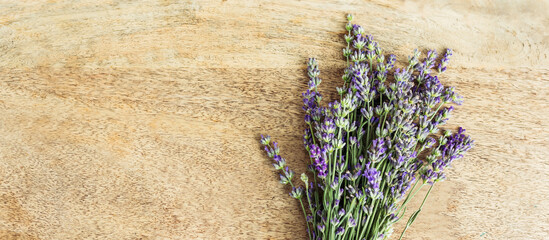 fresh lavender bouquet on wooden background, copy space