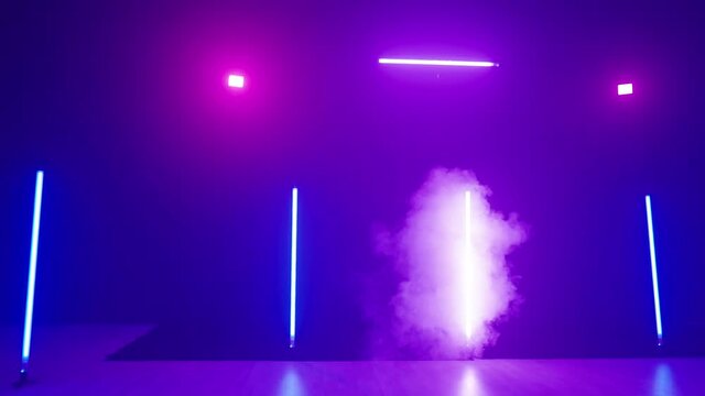 Funny Young Man Worm Dance Slide Over The Camera Frame In Neon Lights 4K