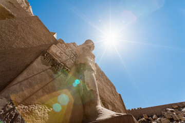 antique statue in the pillared hall in Luxor in Egypt