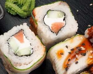 Japanese menu. Asian cuisine. roll canada with eel. sushi from fresh fish. healthy and proper nutrition concept. close-up
