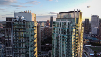 Aerial shot of downtown Mississauga during late afternoon before sunset on a summer day. City...