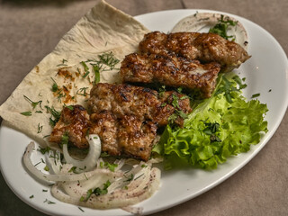 Lamb lula kebab with herbs and onions