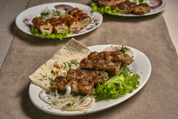 Lamb lula kebab with herbs and onions