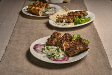 Beef lula kebab with herbs and onions