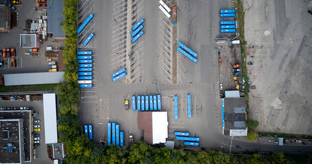 Top down aerial view of parking buses