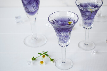 crystal glasses with lavender liqueur