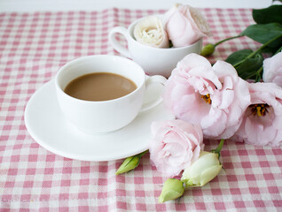 Fototapeta na wymiar coffee with milk and beautiful roses