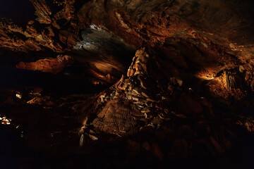 Koneprusy, Czech Republic, 24 July 2021: Natural dripstone rock formations with stone decoration in Koneprusy limestone caves in Bohemian Karst, underground world with stalagmite and stalactite halls