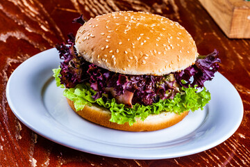 Hamburger on white plate