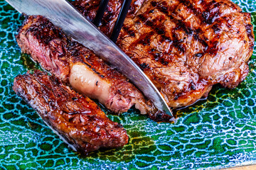 Sliced grilled meat steak Rib-eye. Close up