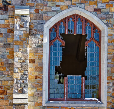 Broken church window from the outside. 