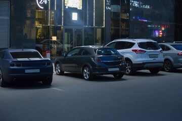 Cars are parked at the nightclub
