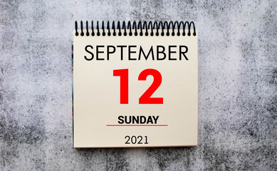 Save the Date written on a calendar - September 12