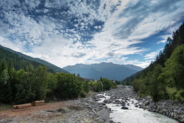 Fototapeta na wymiar Frodolfo river panorama near Bormio, Italy