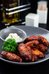 american buffalo wings with sauce, a traditional American snack