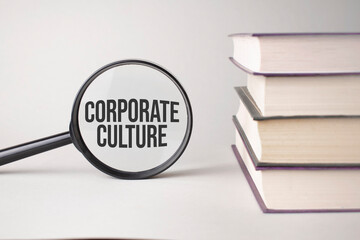 The inscription corporate culture is written and the books. Content lettering is essential for...