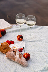 Summer picnic with camamber cheese, baguette and fruits