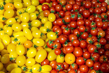 the delicious red and yellow cherry tomatoes