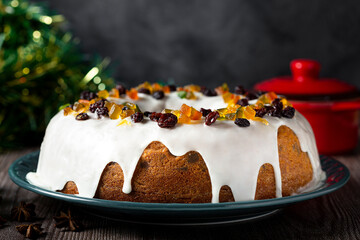 Christmas cake with fondant and candied fruit.