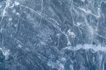 Texture of gray stone with white pattern. Top view.