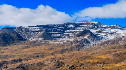 In the early morning rain and hail fell at sunrise I saw this beautiful hill covered with hail, very typical in the sierra of Peru, this place is close to the city of Hauncavelica