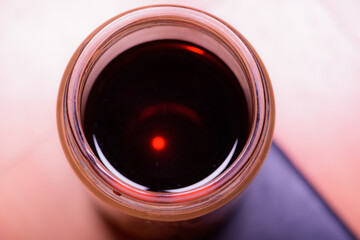 Take a close-up shot of a glass of tea from above