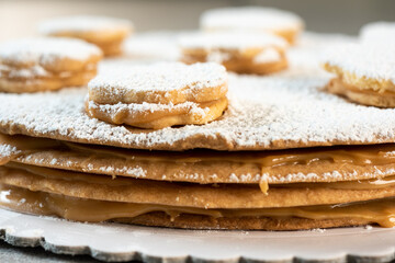 Peruvian alfajor cookie with caramel and white sugar dust