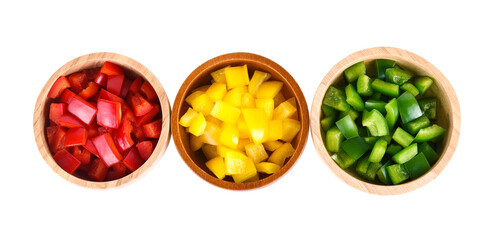 fresh sweet pepper, red, yellow,  green paprika, in wooden bowl isolated on white background