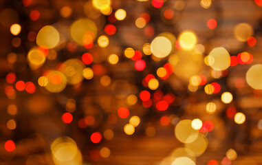 Holiday, beautiful shiny Christmas lights, glowing magic bokeh. Abstract gold bokeh light night...