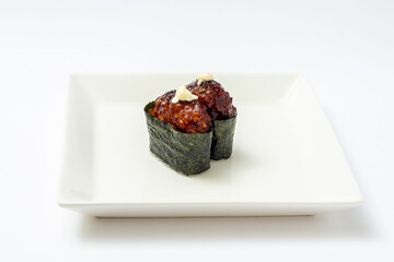 teriyaki meatball sushi on a plate