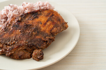 spicy grilled Jamaican jerk chicken with rice