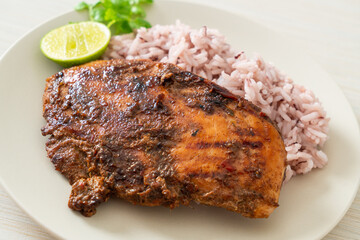 spicy grilled Jamaican jerk chicken with rice