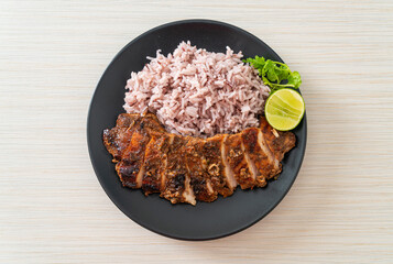 spicy grilled Jamaican jerk chicken with rice