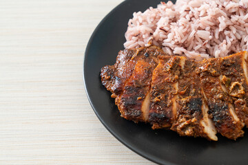 spicy grilled Jamaican jerk chicken with rice