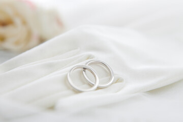 A close up of two wedding rings