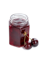 Jar of tasty cherry jam on white background