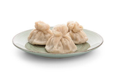 Plate with tasty dumplings on white background