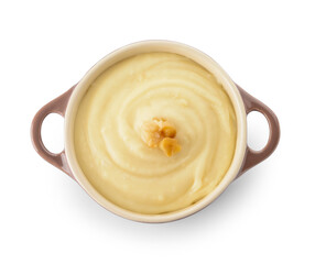 Cooking pot of tasty mashed potatoes with garlic on white background