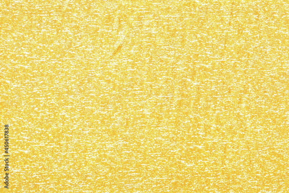 Poster the texture of a soft knitted cotton fabric is yellow with speckles. abstract background of soft fab