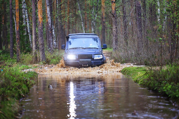 Fototapeta na wymiar SUV forest ford across the river extreme road tourism 4 on 4
