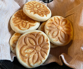 Delicious Italian Tigelle in a wicker basket. Italian Cuisine