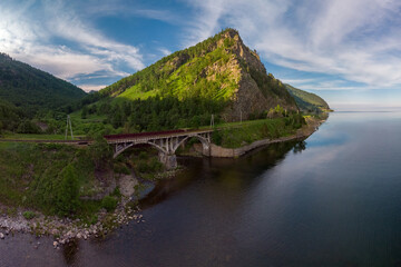 Fototapeta premium Aerial view of the railway bridge over the Shabartui river