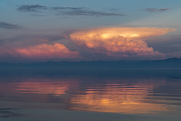 Red clouds at sunset over Lake Baikal