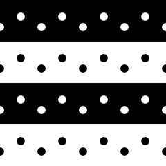 In one black and white lines with polka dots. Simple dots and opposite color background.