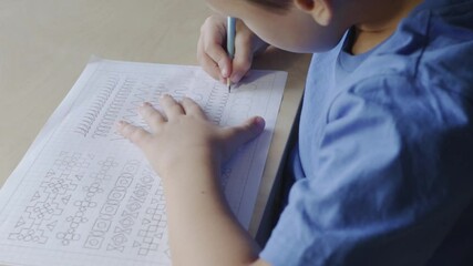 Close up of child doing writing homework