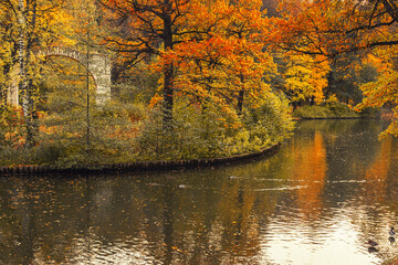 View of Island Arch and pond in Tsaritsyno park on autumn day. Moscow