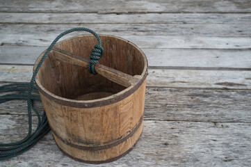 cask and rope on wood
