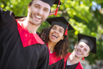 A group of graduates feeling happy and excited