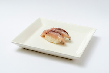 horse mackerel sushi on a plate