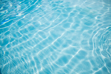 Surface of blue swimming pool. Summer water sport, recreational background. Texture of water surface, blue turquoise vivid bright sunny day closeup.